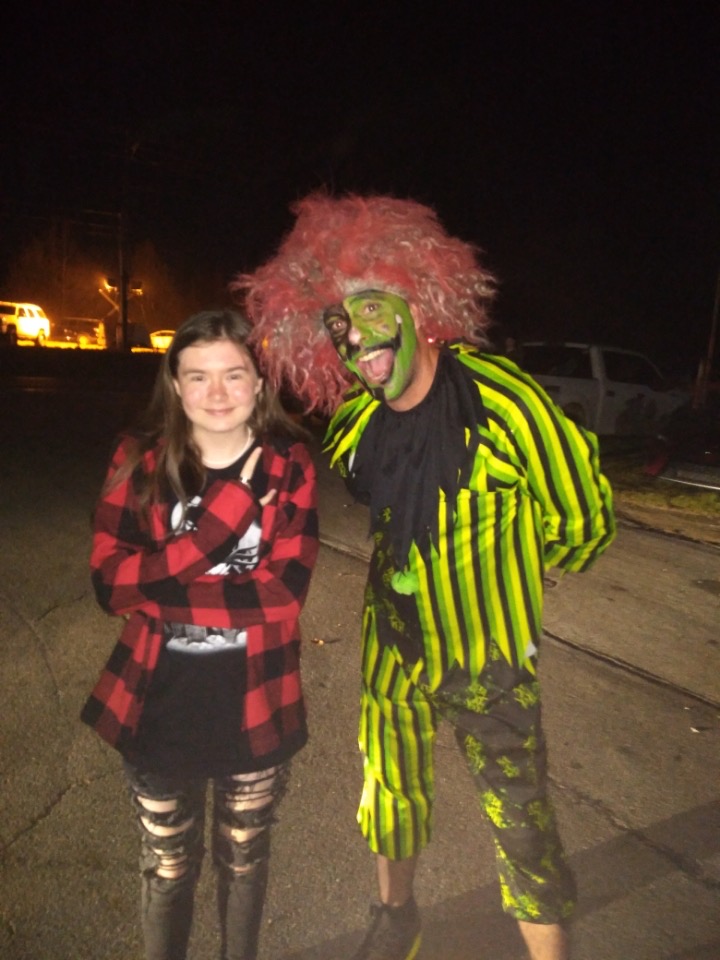Author Chloe Battles and a costumed performer 